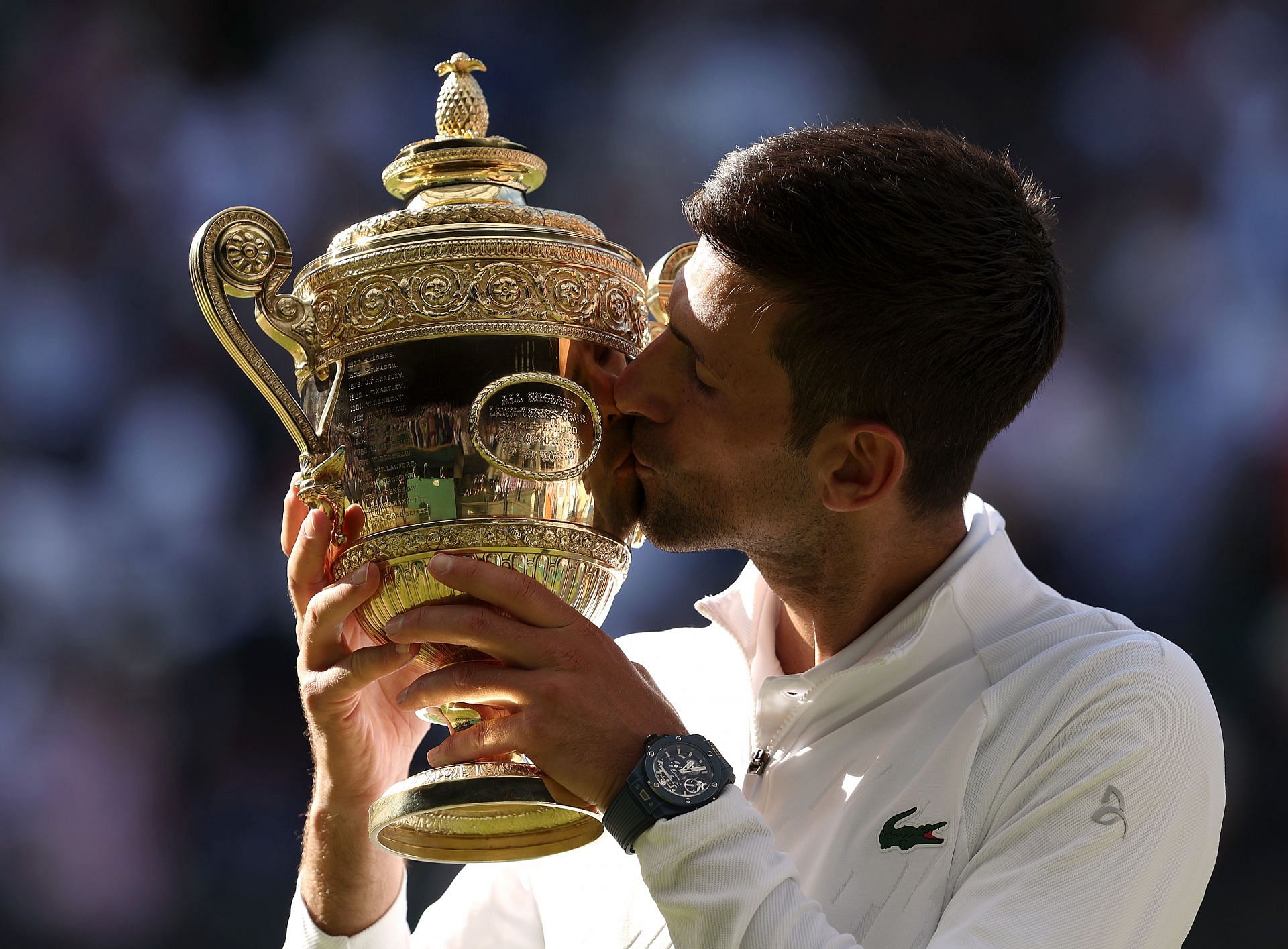 Novak Djokovic with the Wimbledon 2022 trophy